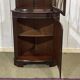 1950s English mahogany corner cabinet