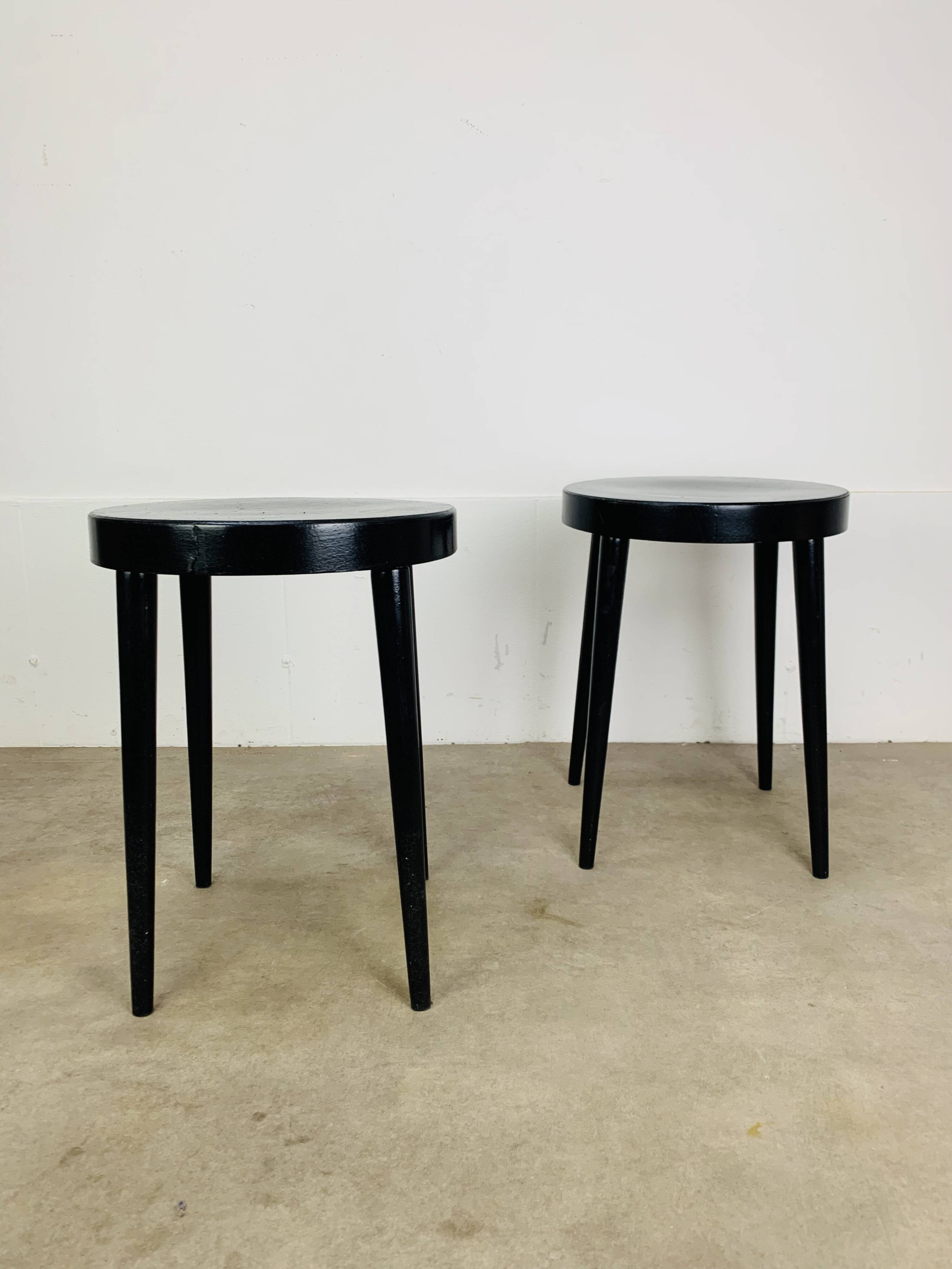 Pair of black Baumann stools, 1960s