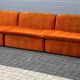 Large Mid Century sectional sofa of 6 elements in orange velvet