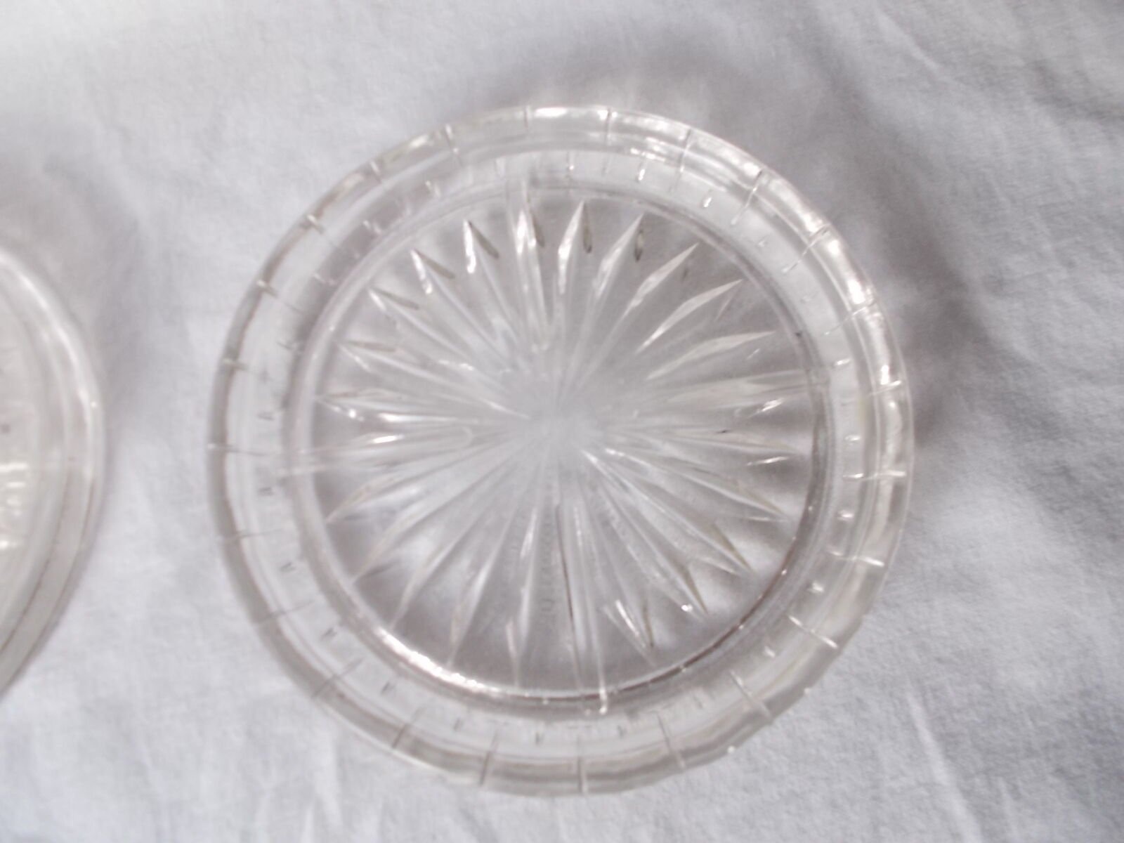 Pair of molded glass bottle mats