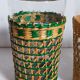Four long drink glasses in vintage woven rattan cases