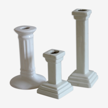 Set of white porcelain candle holders column shape