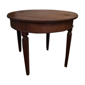 Old folding round table in solid oak