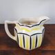 Vintage Ceramic Jug with Yellow and Black Decoration