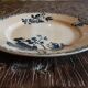 Ancient round iron earth dish