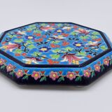 A flat bottom and two enamel bottle bottoms of Longwy