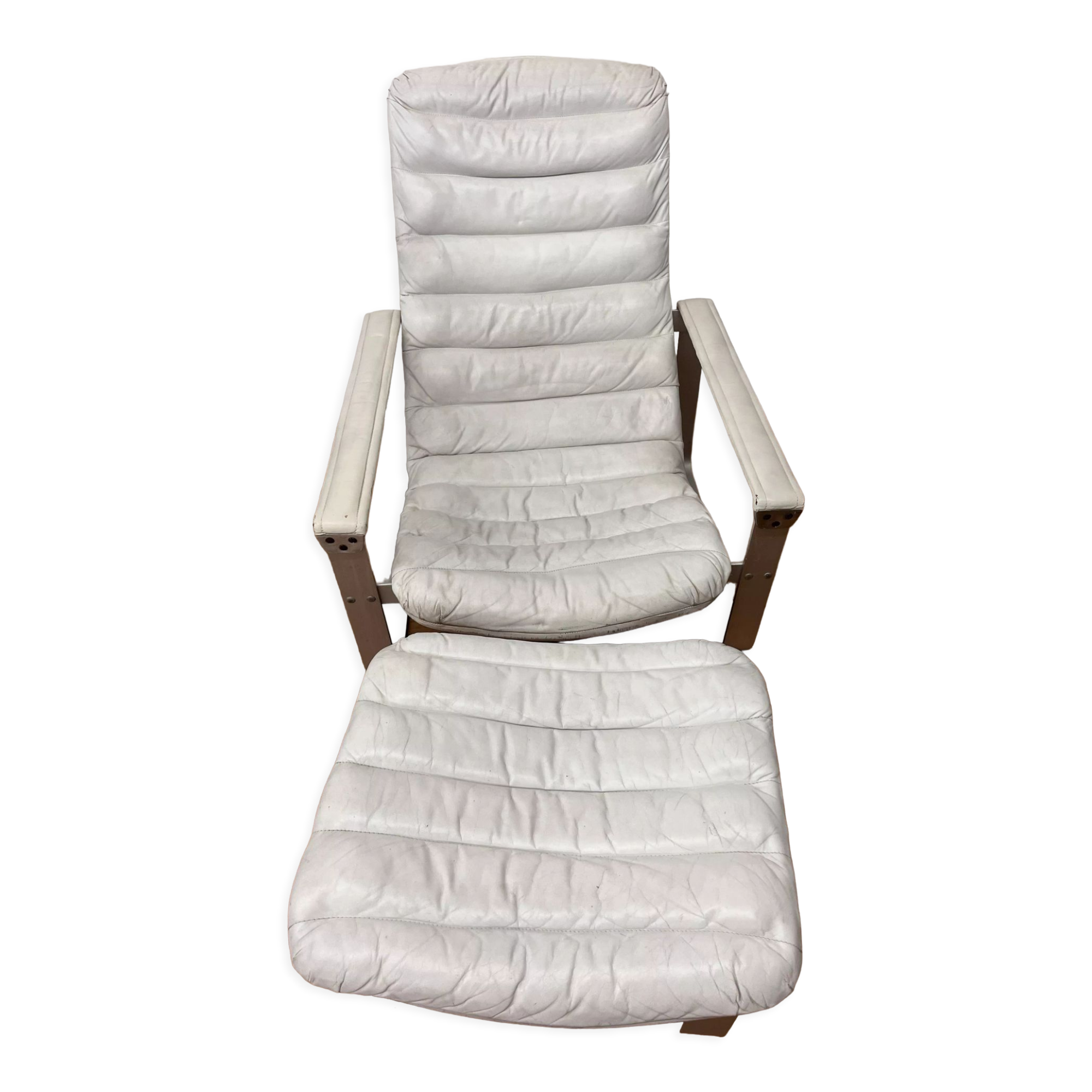 Pulkka armchair by Ilmaria Lappalainen and its ottoman
