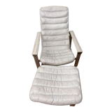 Pulkka armchair by Ilmaria Lappalainen and its ottoman