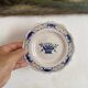 Dessert plates in Rouen faience with hand decoration.