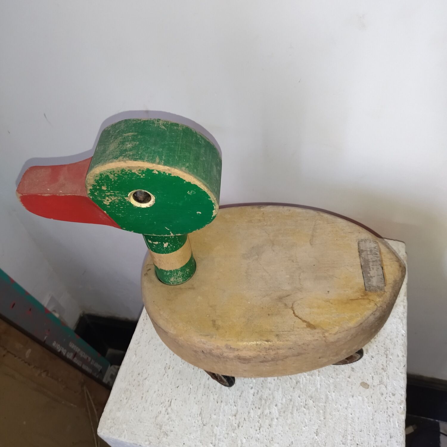 Old toy duck to pull in wood 50s
