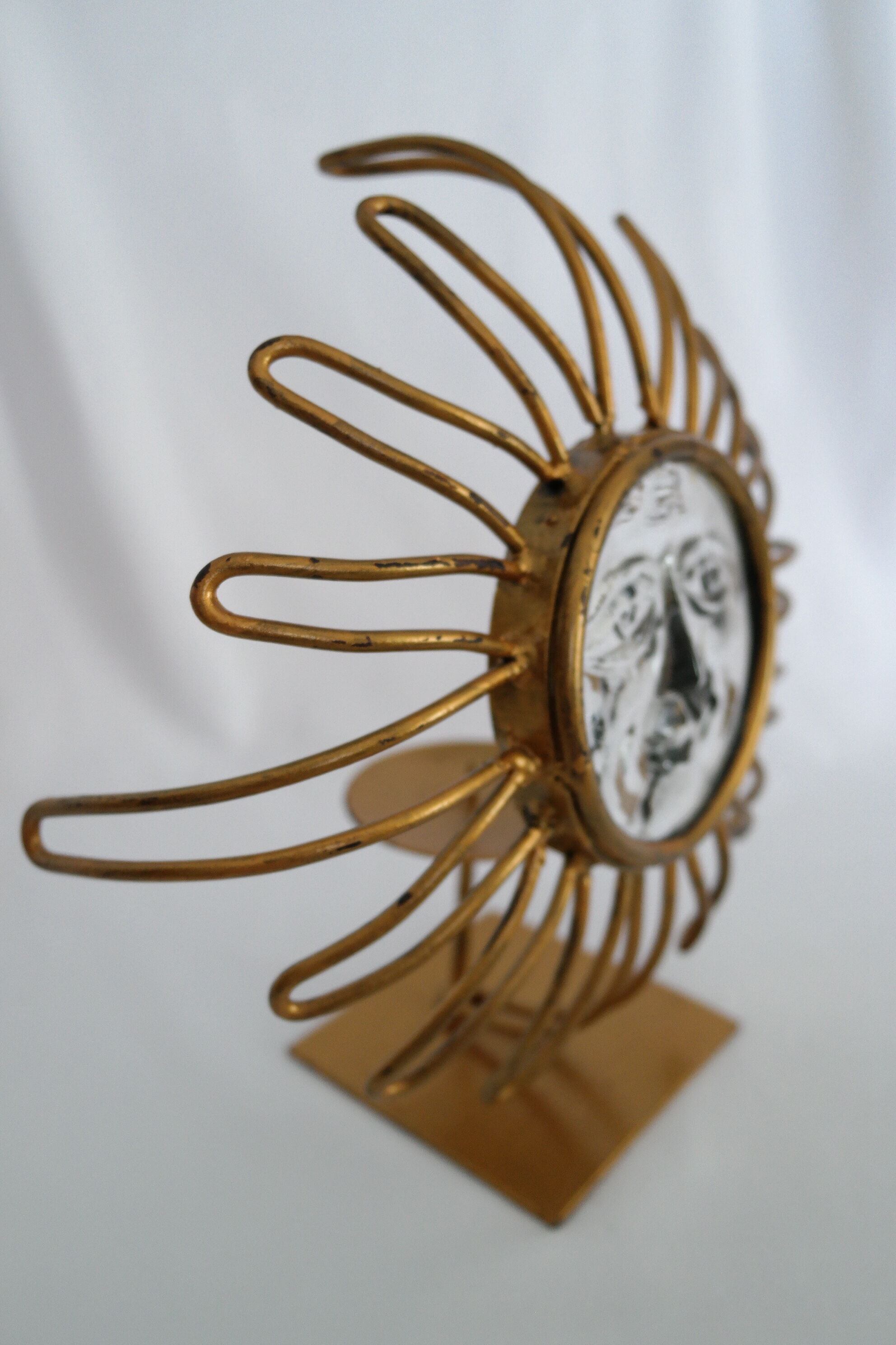 Vintage sun candlestick