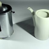 Art Deco porcelain coffee pot by SUS Bavaria with a metal warming hood by WMF, comes from the 1920s