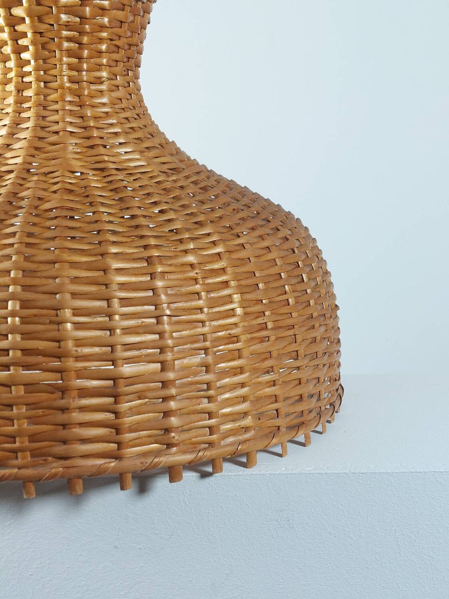 Vintage rattan lampshade from the 70s, mid-century style.