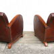 Paire de fauteuils art-déco en cuir
