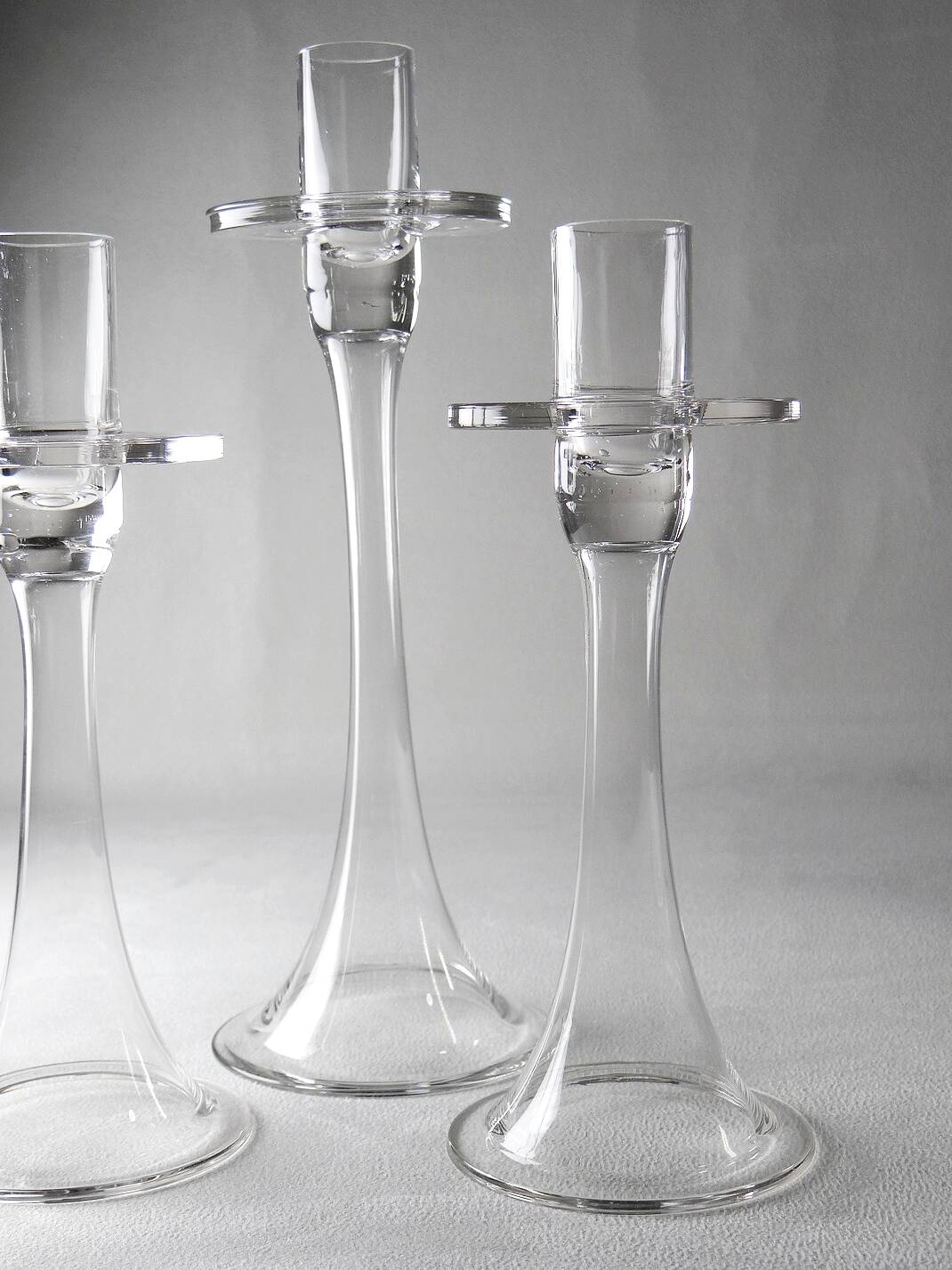 Trois bougeoirs en cristal vintage