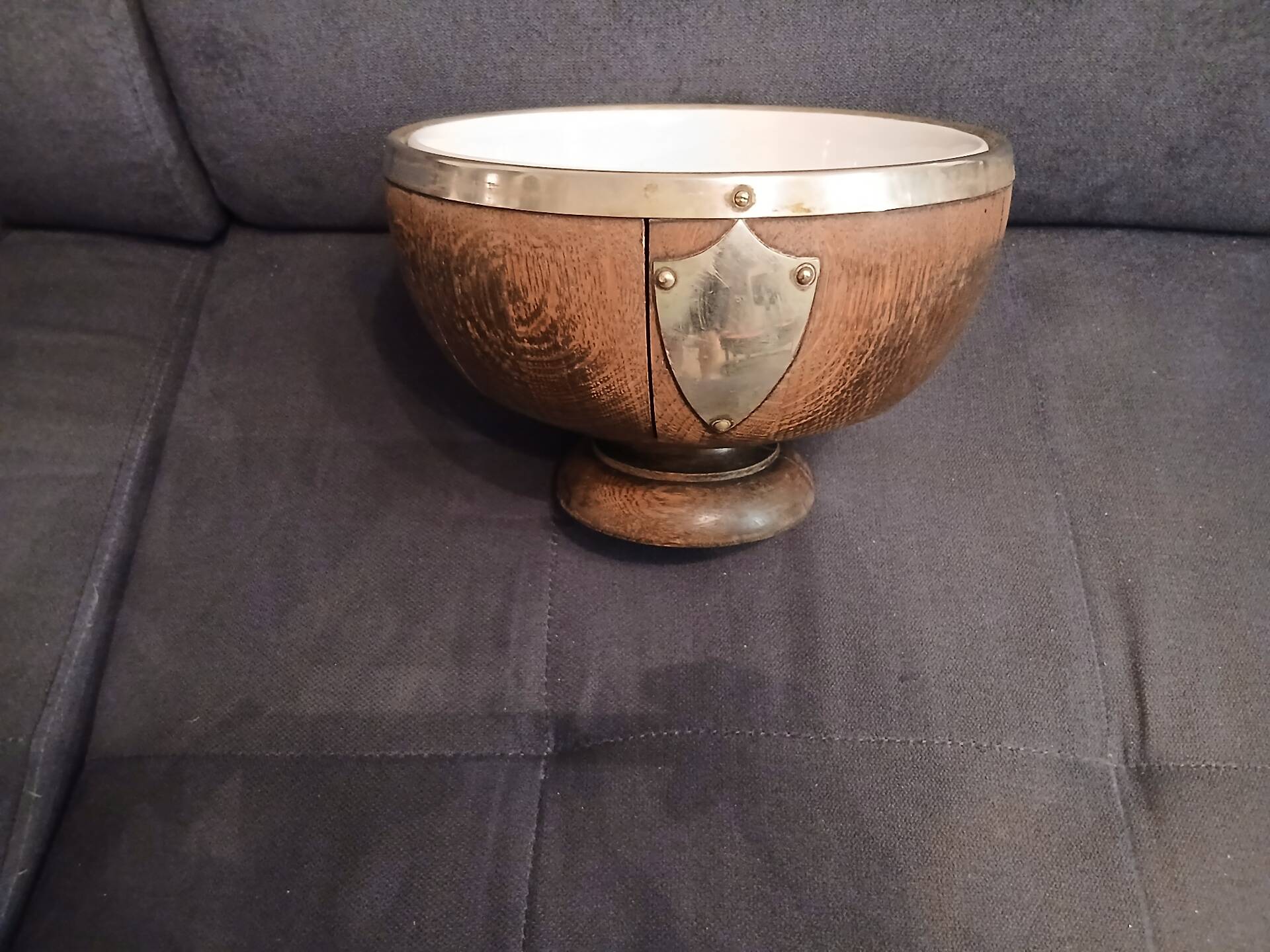 Victorian era silver-plated bowl with oak wood.