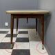 cream and green color 1960s formica dining table enlarge and changing in height
