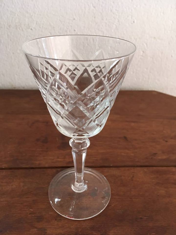 Four mismatched stemware