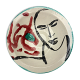 Ceramic plate decorated with a face