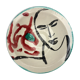 Ceramic plate decorated with a face