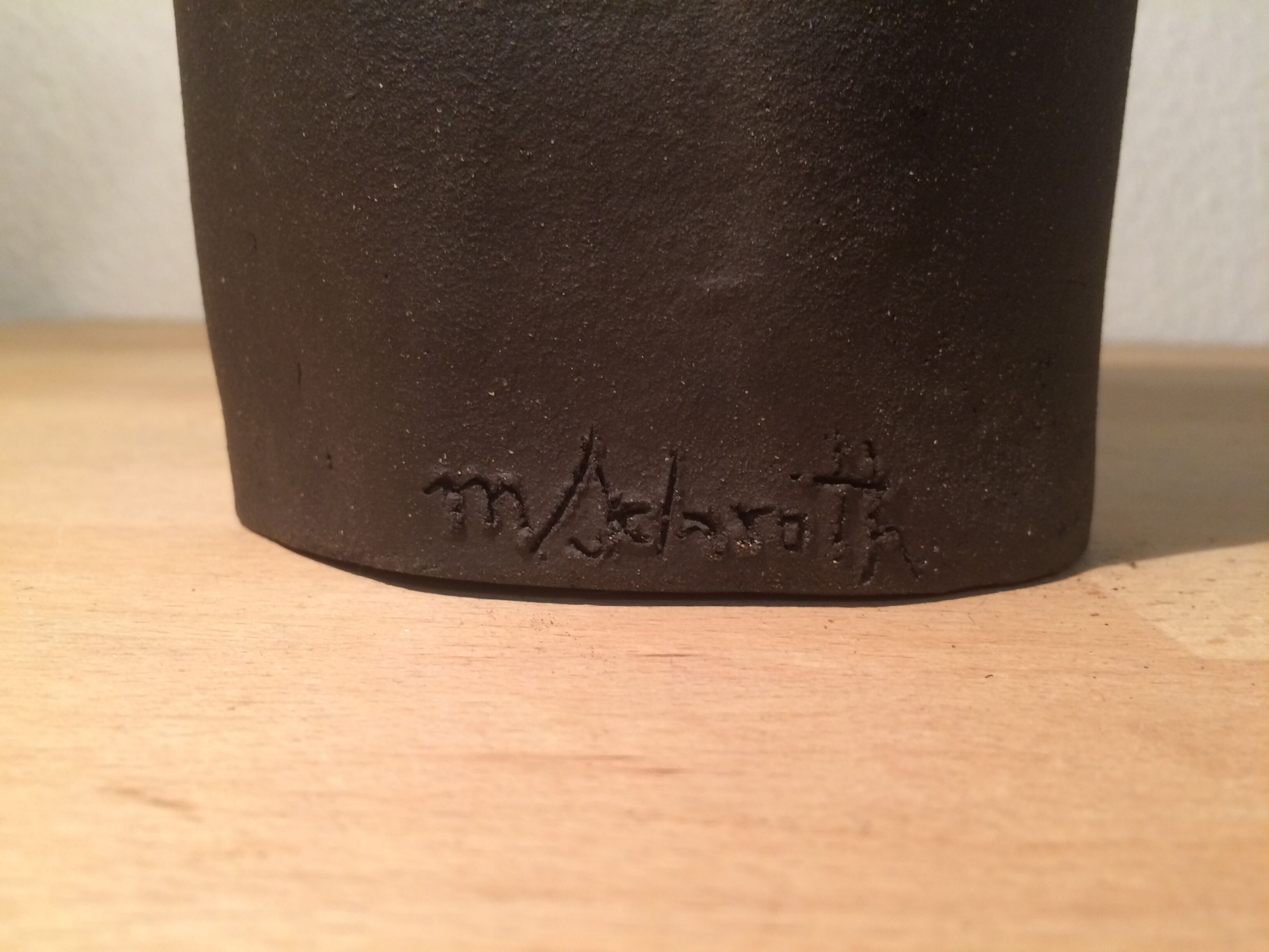 Ceramic vase face, black and white