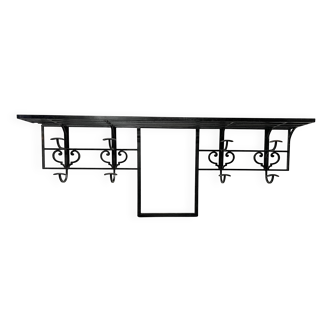 Art Deco wall coat rack in hammered wrought iron, 20th century.