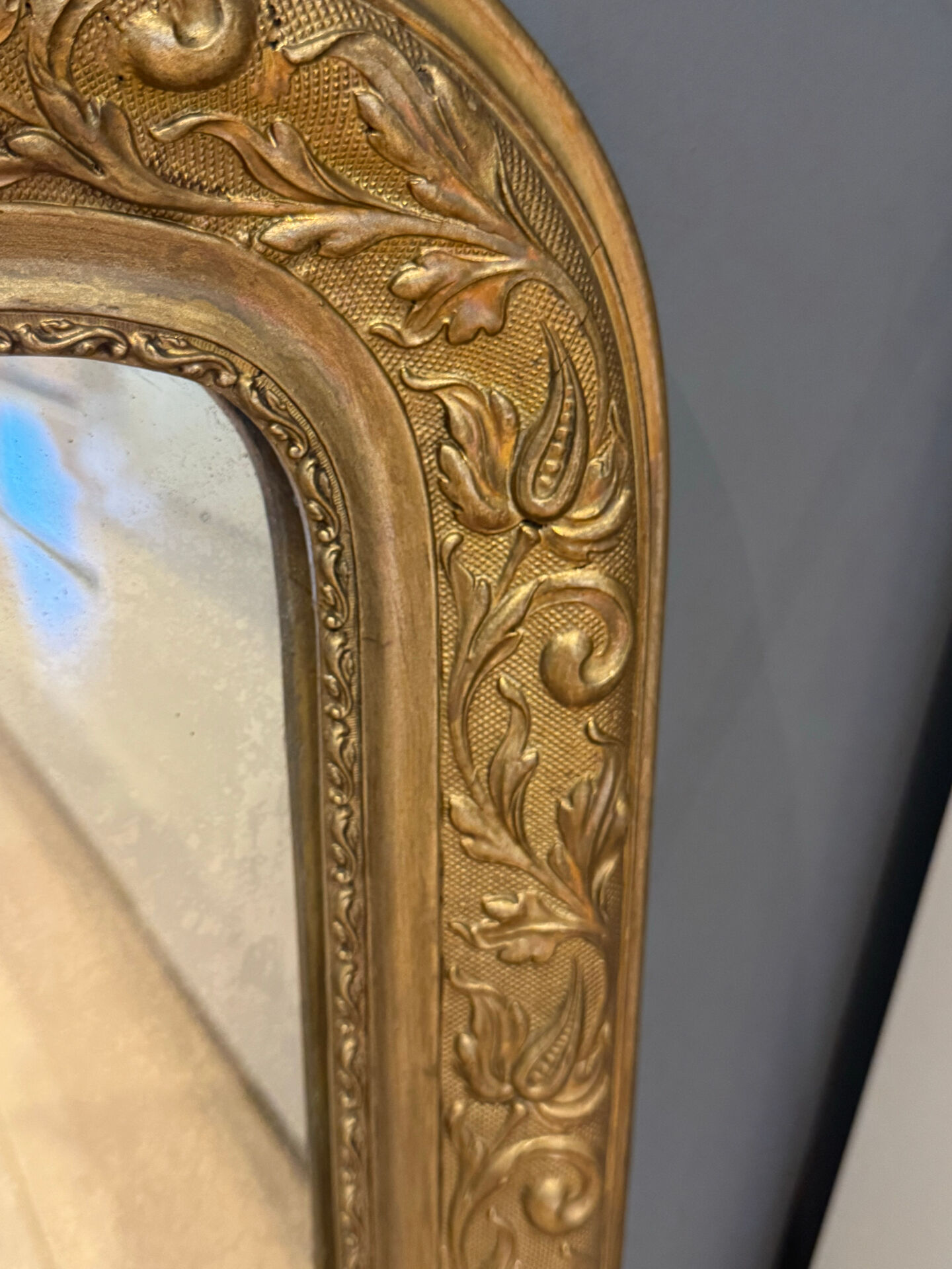 Golden mirror with mouldings