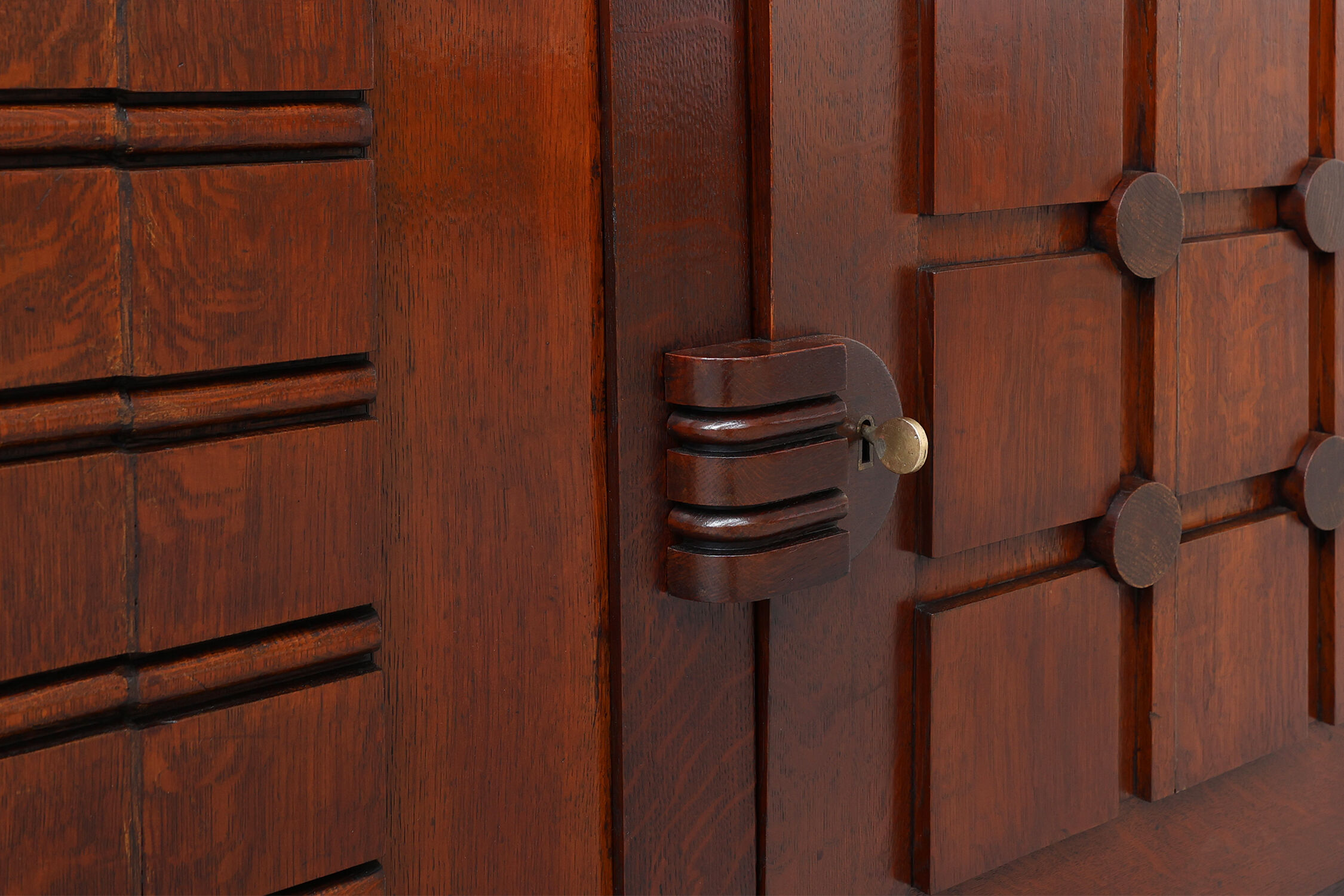 Art Deco carved geometric sideboard by Charles Dudouyt in oak, France ca. 1