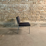 Armchair in metal and grey fabric