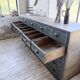 Patinated blue workshop furniture with XL drawers in oak and beech.
