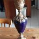 Pair of golden regulated ewers and blue glass