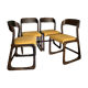 Suite of four Baumann sled chairs