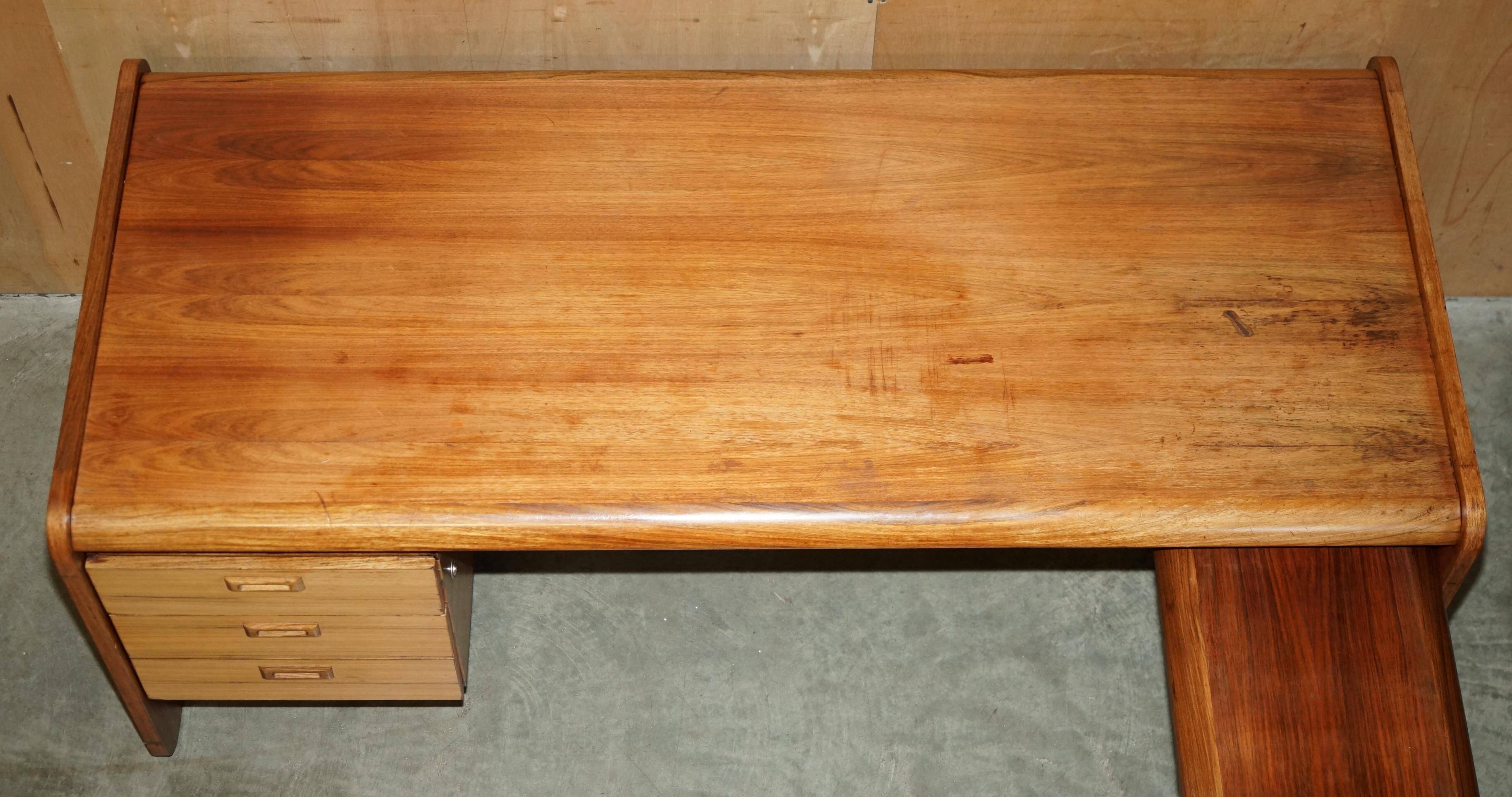 Mid-century modern right-angle desk in Brazilian wood.