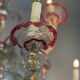 Venetian Rezzonico chandelier in colourless and red Murano glass, circa 1900.