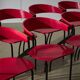 Red Plywood and Curved Metal Frame Chair