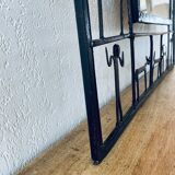 Mirror in ironwork of art