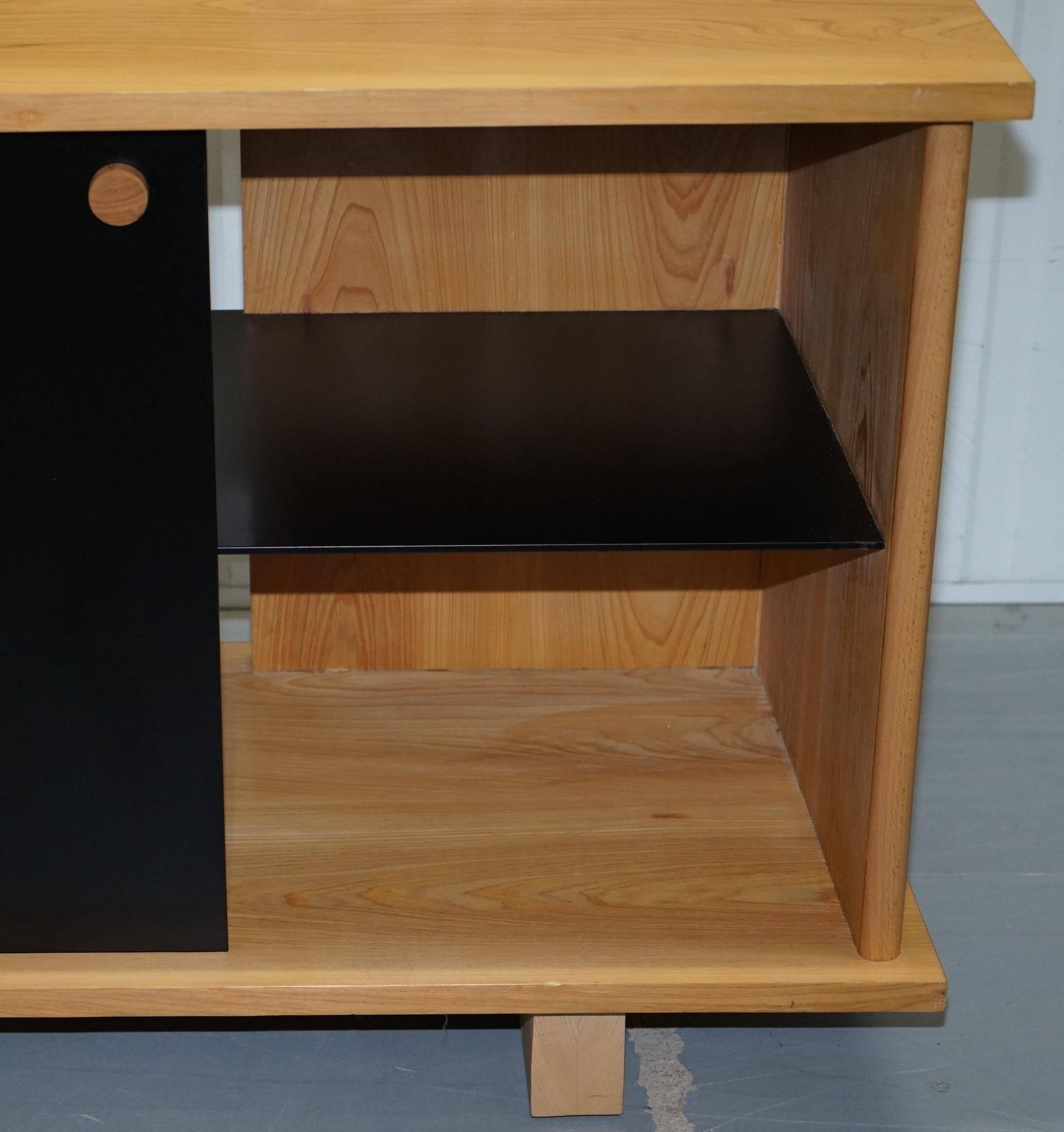 Buffet Ralph Lauren with polished slate stone and rosewood shelves.