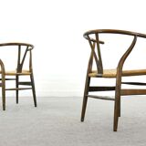 Pair of CH24 wishbone dining chairs by Hans Wegner for Carl Hansen Denmark