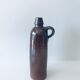 Bouteille antique avec anse