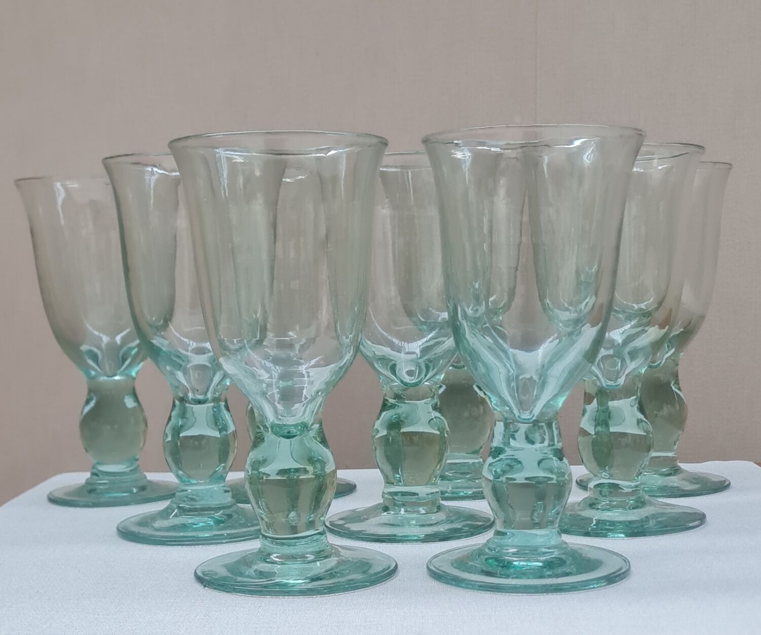 Service of 9 large blown glass stemmed glasses