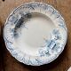 Set of 8 mismatched antique ironstone deep plates.