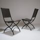 Foldable chair in wrought iron and leather. c. 1950