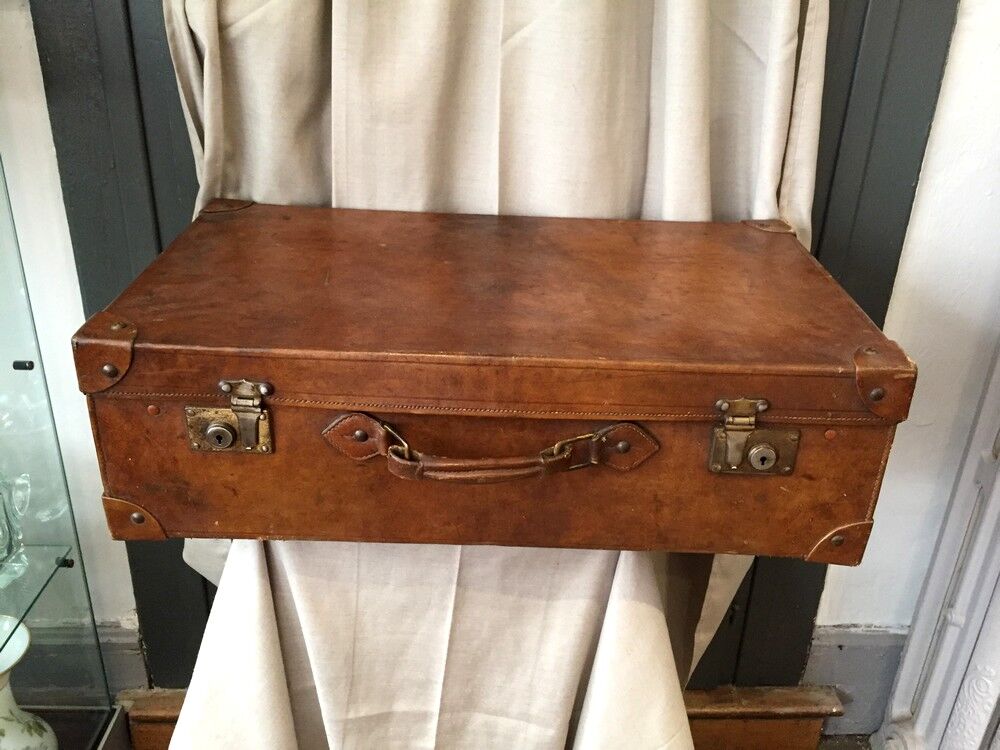 Vintage suitcase in indoor leather light khaki fabric