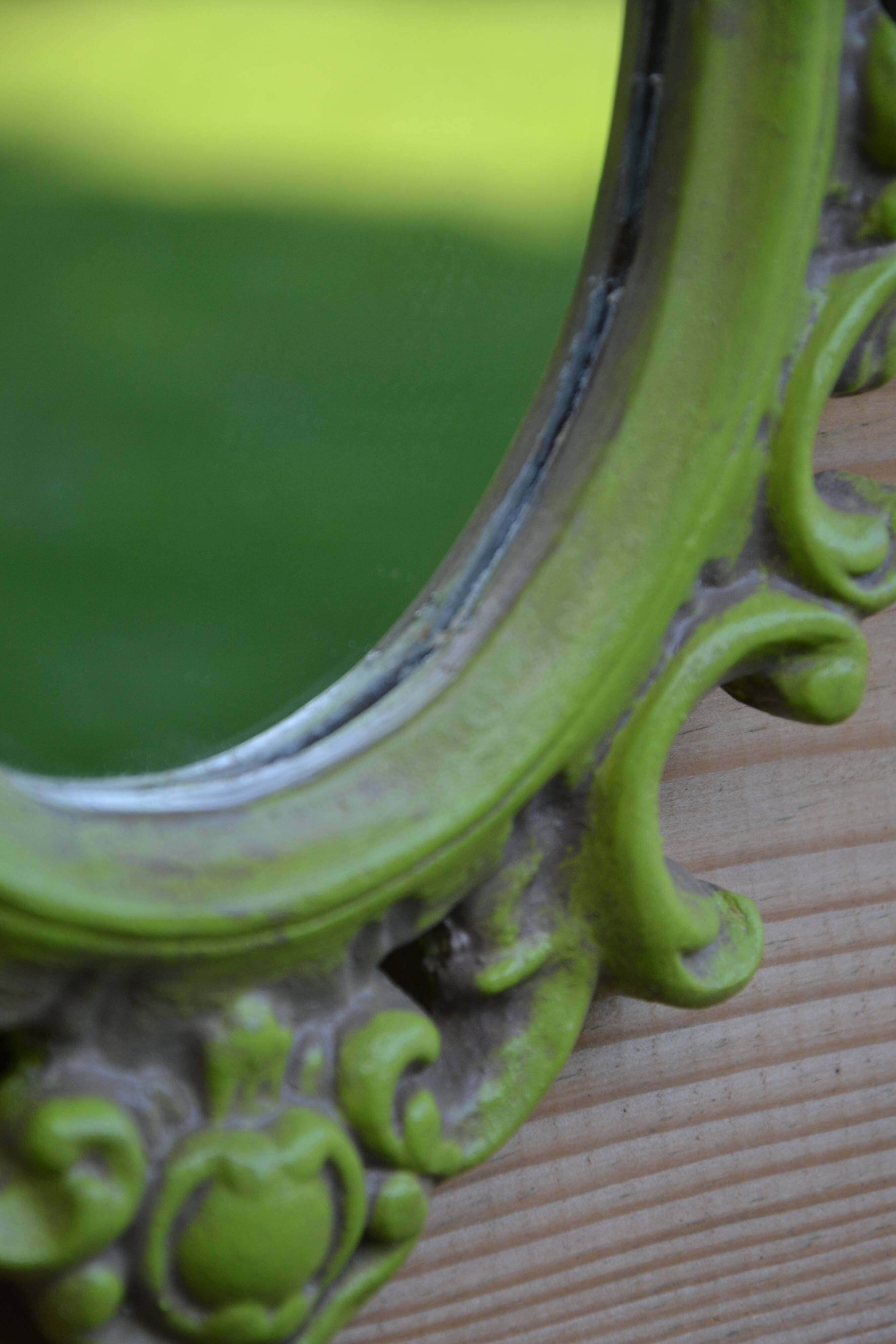 Small green wooden mirror