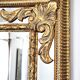 Grand miroir italien doré en bois à verre biseauté
