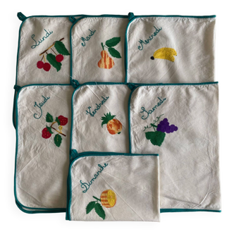 Set of 7 70's tea towels - hand-embroidered & braided weekly - cotton - 50x38 cm