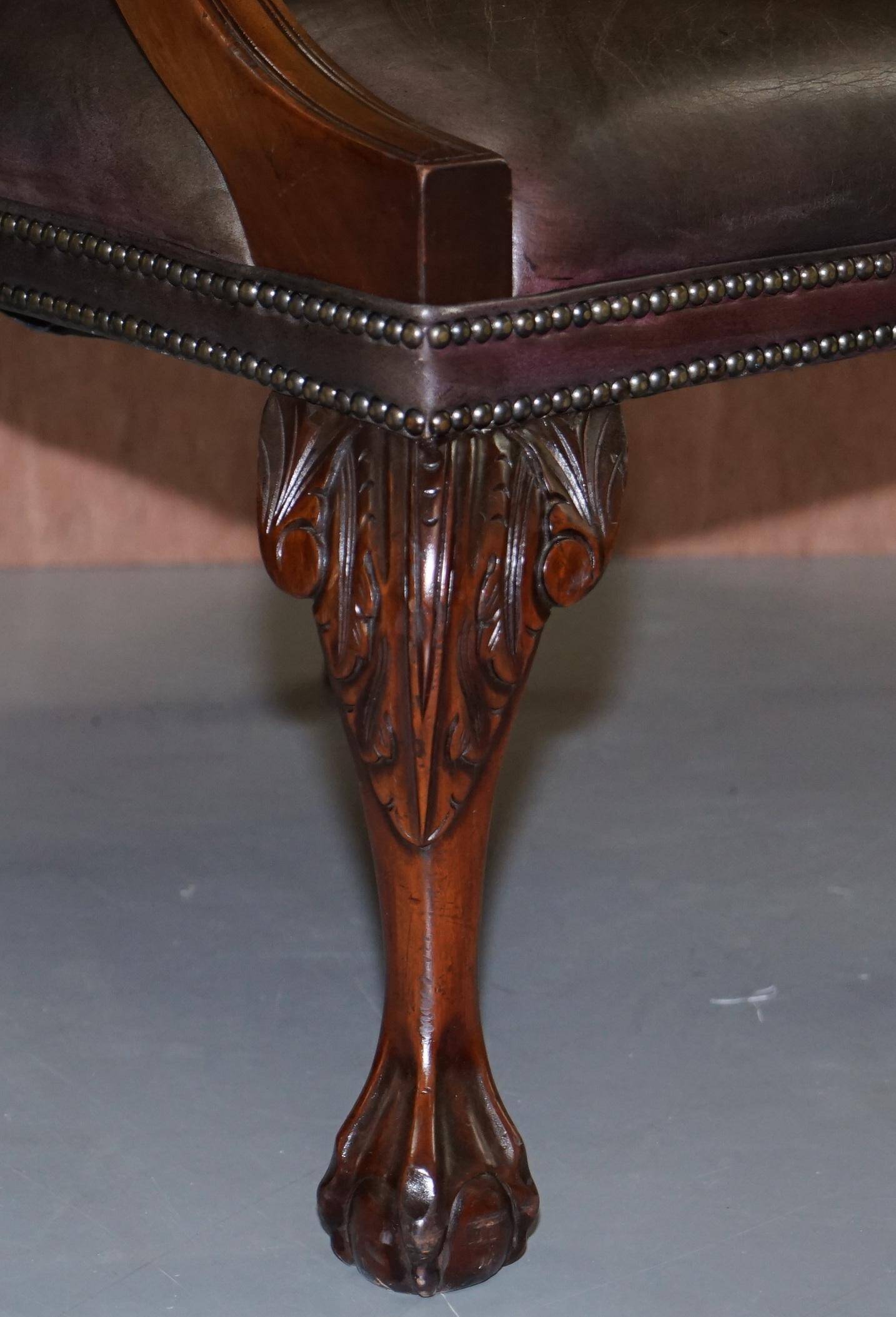 Gainsborough armchair George II leather Chesterfield hand-carved with claw and ball feet.