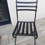Glass and metal table with 8 chairs