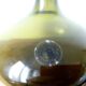Petit vase boule en verre fait main vert foncé