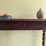 Large walnut desk with turned legs